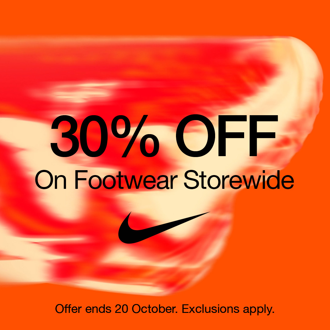 -30% written on shoes throughout the store and Nike logo