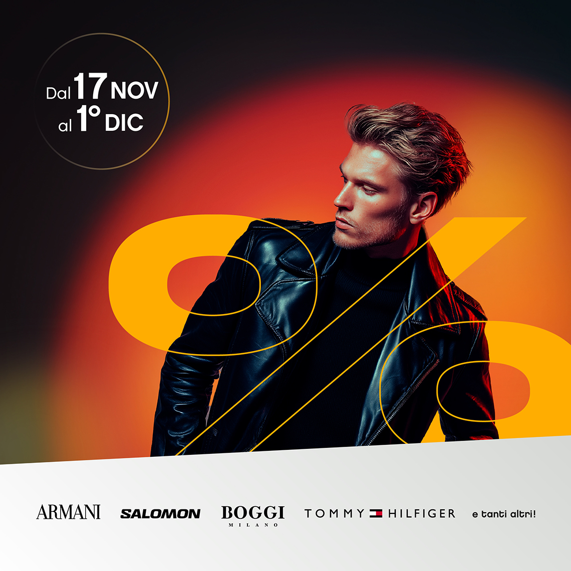 uomo vestito interamente di nero e simbolo della percentuale arancione